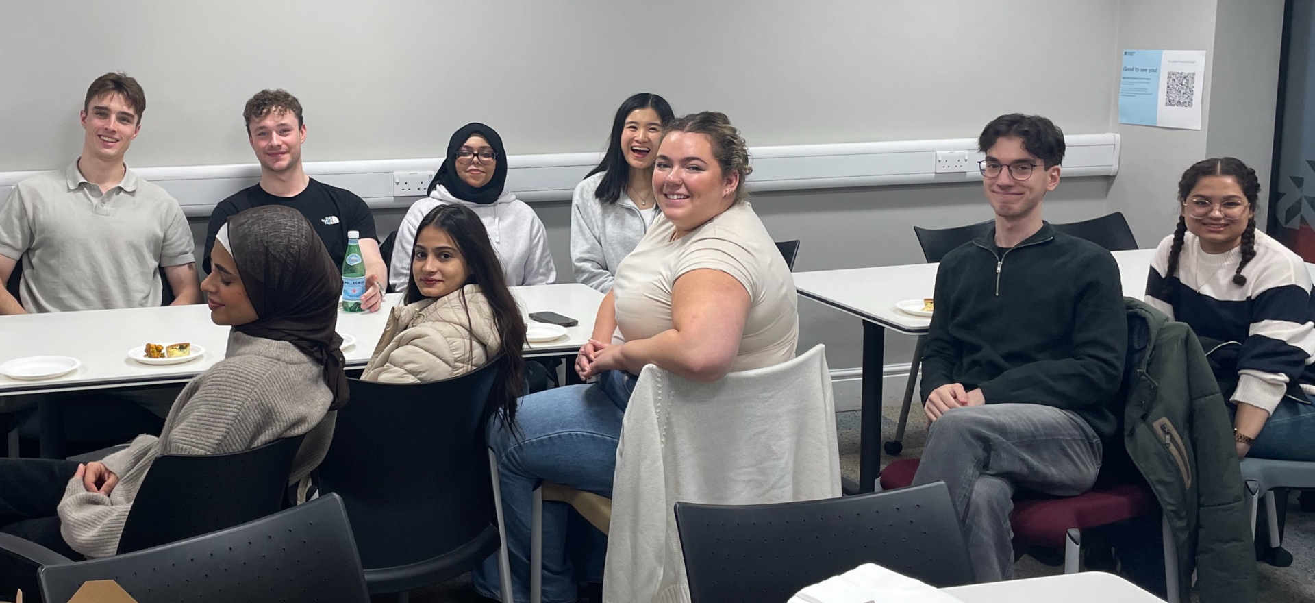 New student leaders meeting - society presidents and school reps seated at a table