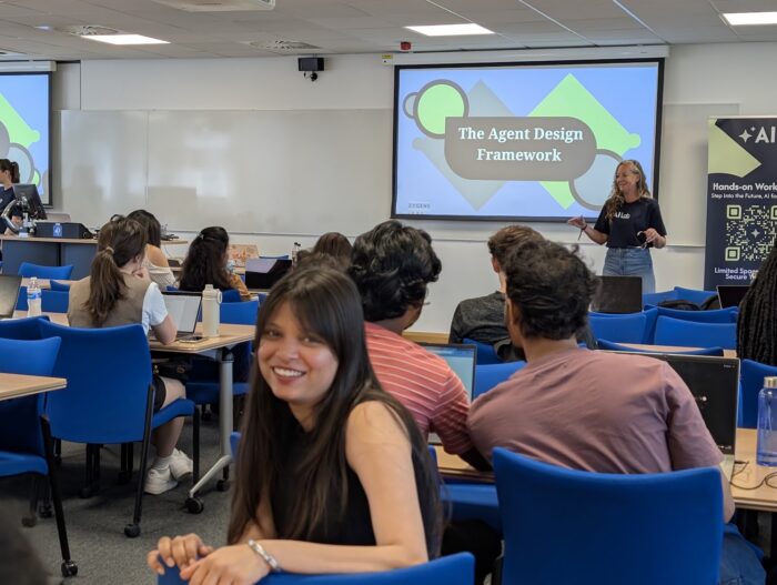 Student turning to face camera and smile during a 2025/26 AI Lab session